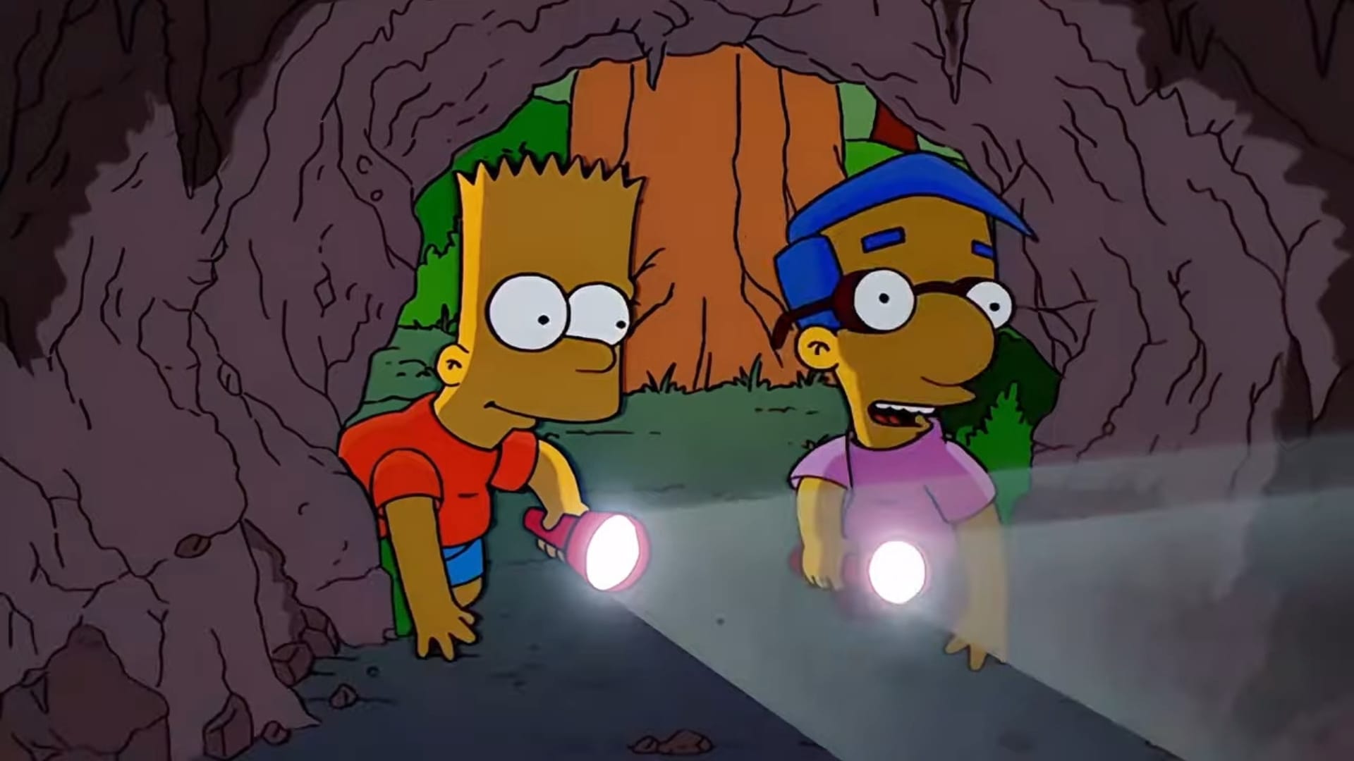 Bart ja Milhouse tutkimassa luolaa. Simpsonien ääninäyttelijä jää eläkkeelle.